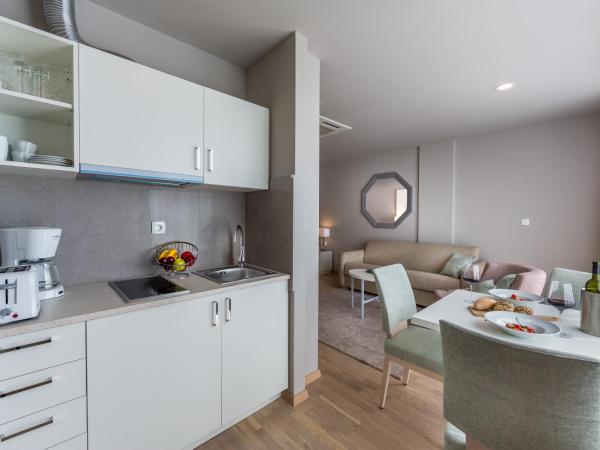 Apartments & Rooms Preelook : photo 9 de la chambre studio