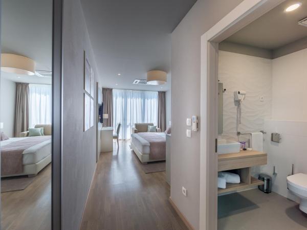 Apartments & Rooms Preelook : photo 10 de la chambre chambre double deluxe