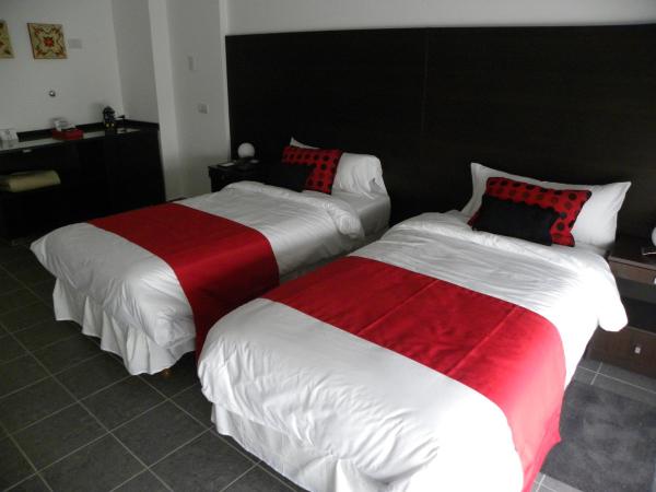 Let Sun Hotel Boutique : photo 1 de la chambre chambre lits jumeaux