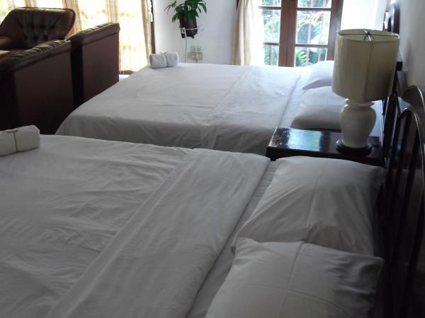 Rim Ping Guest House : photo 2 de la chambre chambre familiale (2 adultes + 2 enfants)