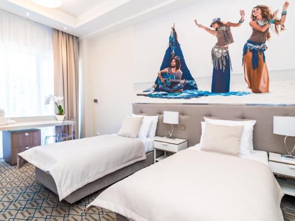 Hotel Atelia : photo 2 de la chambre suite familiale deluxe