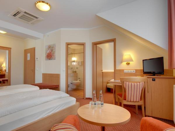 Hotel Kriemhild am Hirschgarten : photo 2 de la chambre suite junior