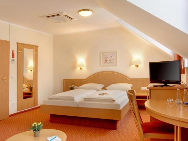 Hotel Kriemhild am Hirschgarten : photo 3 de la chambre suite familiale