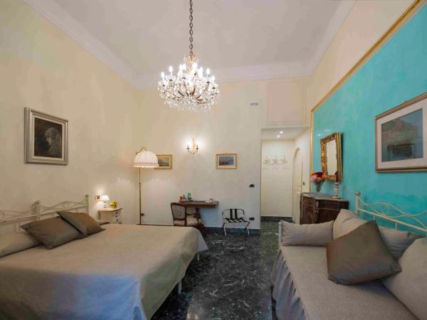 B&B Residenza Via Dei Mille : photo 1 de la chambre chambre quadruple