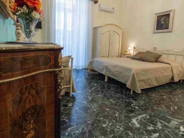 B&B Residenza Via Dei Mille : photo 3 de la chambre chambre quadruple