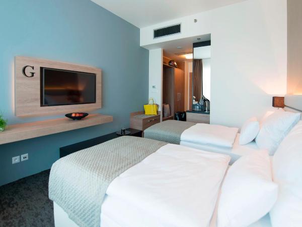 Grid Hotel : photo 1 de la chambre chambre double ou lits jumeaux standard