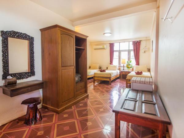 Pongphen Guesthouse - SHA Plus Certified : photo 3 de la chambre chambre triple supérieure