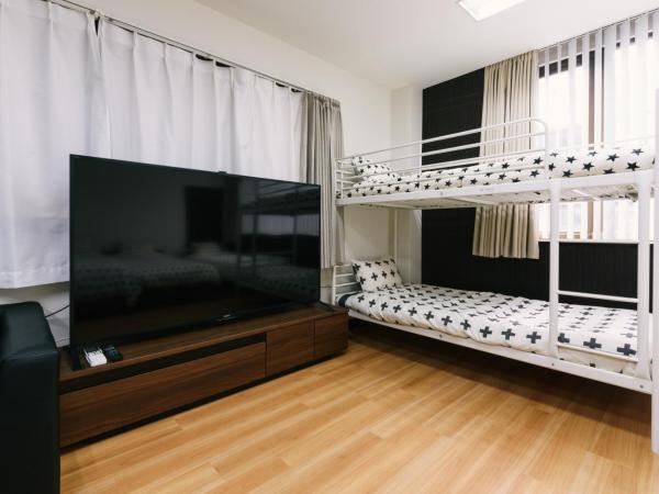 Guest House Yasuragi Hakataekimae : photo 2 de la chambre chambre familiale deluxe