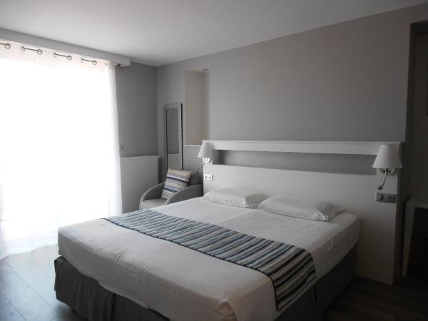 Hôtel Valencia : photo 2 de la chambre chambre double ou lits jumeaux - vue latérale sur mer
