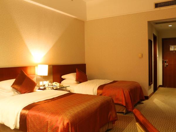 Jinling Jingyuan Plaza : photo 5 de la chambre chambre lits jumeaux deluxe