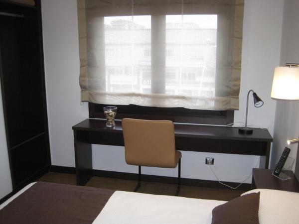 Suites Coruña : photo 5 de la chambre chambre lits jumeaux