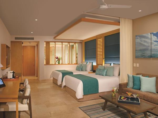 Dreams Playa Mujeres Golf & Spa Resort - All Inclusive : photo 2 de la chambre suite junior 2 lits queen-size - vue sur jardin