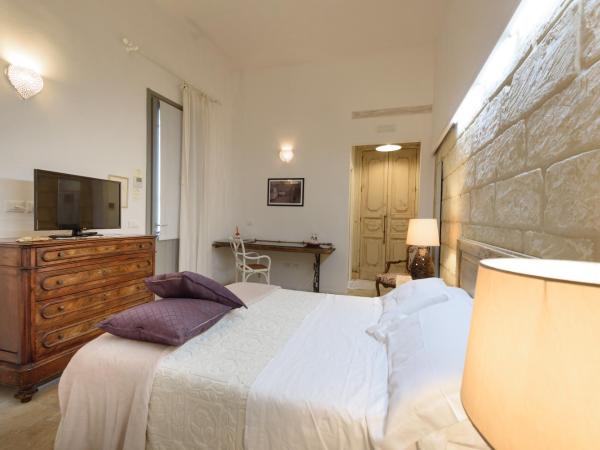 Palazzo Dei Dondoli : photo 3 de la chambre chambre triple