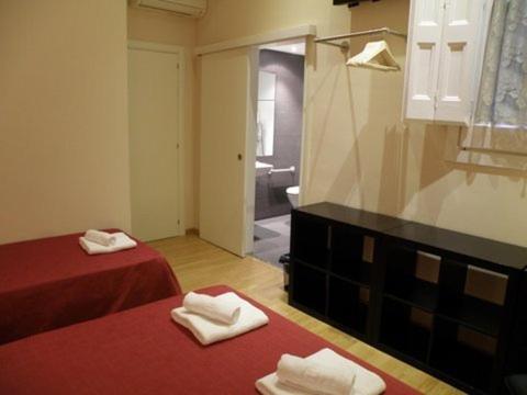 Center Gran Via : photo 2 de la chambre chambre double avec lit d'appoint
