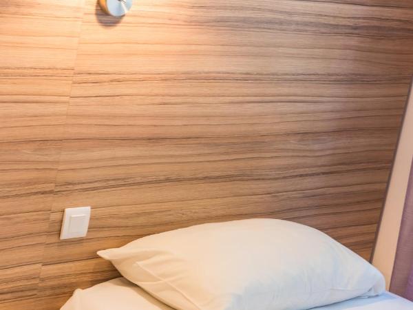 L'Oasis Hotel : photo 8 de la chambre chambre lits jumeaux