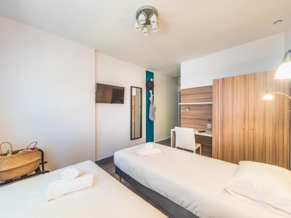 L'Oasis Hotel : photo 2 de la chambre chambre lits jumeaux