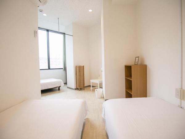 123 Guesthouse : photo 5 de la chambre triple room with shared bathroom - b