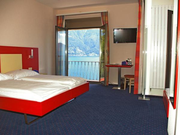 Hotel Arancio : photo 1 de la chambre chambre triple panorama avec balcon - vue sur lac