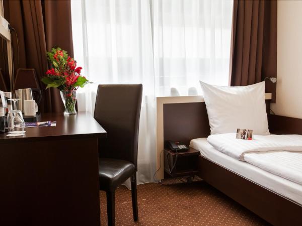 Hotel Diament Spodek : photo 1 de la chambre chambre simple