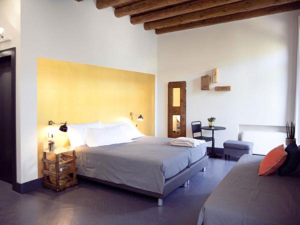 Pepita Lodge : photo 2 de la chambre chambre quadruple de luxe avec balcon