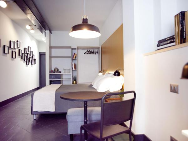 Pepita Lodge : photo 6 de la chambre grande chambre double - vue sur jardin