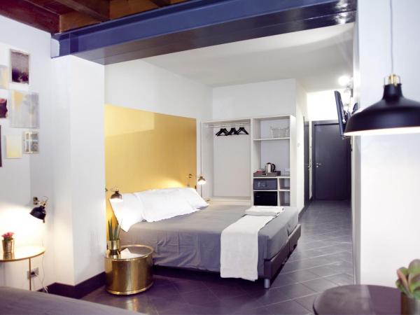 Pepita Lodge : photo 8 de la chambre grande chambre double - vue sur jardin