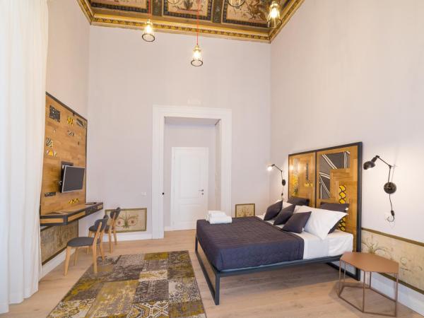 The Dante House by House In Naples : photo 3 de la chambre chambre triple de luxe