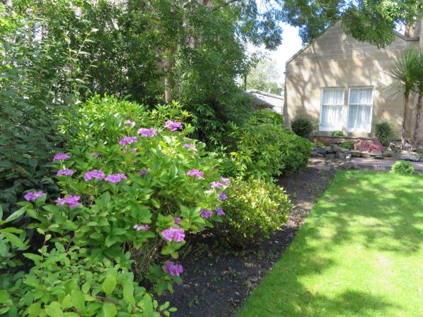 Duthus Lodge Guest House : photo 7 de la chambre chambre lits jumeaux standard avec vue sur jardin