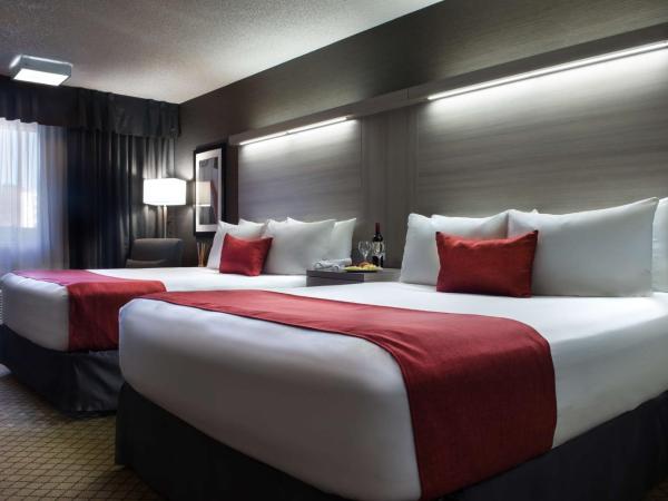 Best Western Plus Village Park Inn : photo 1 de la chambre chambre deluxe avec 2 lits queen-size - non-fumeurs