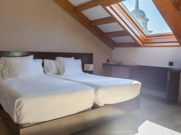 Hotel San Miguel : photo 3 de la chambre chambre lits jumeaux