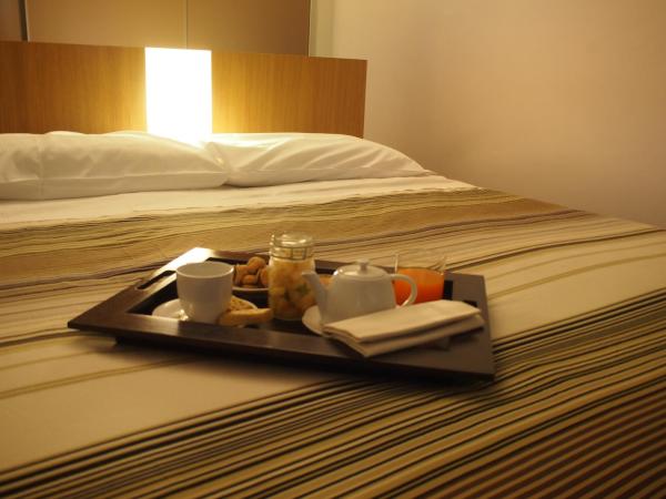 Parizzi Suites & Restaurant : photo 1 de la chambre appartement supérieur 1 chambre