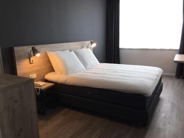 Joy Hotel : photo 1 de la chambre chambre lit queen-size deluxe