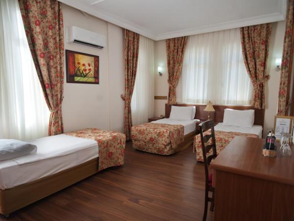 Triana Hotel : photo 4 de la chambre chambre triple Élite