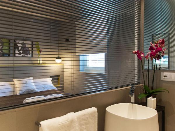 CinqueSuites Ortigia : photo 4 de la chambre suite de luxe avec salle de bains décloisonnée