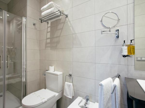 Legazpi Doce Rooms & Suites : photo 7 de la chambre studio 2 chambres avec balcon