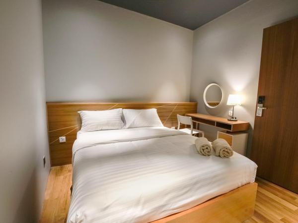 The Bed KLCC : photo 8 de la chambre chambre lit queen-size privée (salle de bains commune)