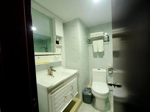 Guangzhou Junshan Hotel - Shuttle bus for Canton Fair : photo 4 de la chambre chambre deluxe double ou lits jumeaux