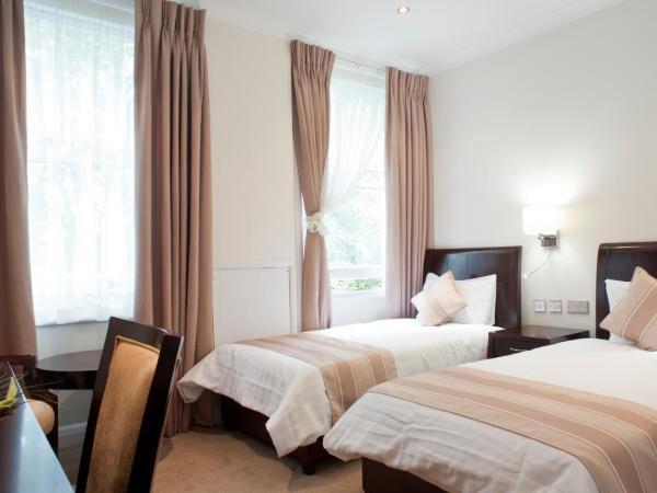 The Villa Kensington : photo 1 de la chambre chambre lits jumeaux