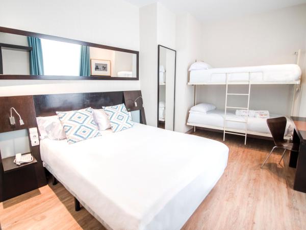 Petit Palace Plaza de la Reina : photo 1 de la chambre chambre quadruple