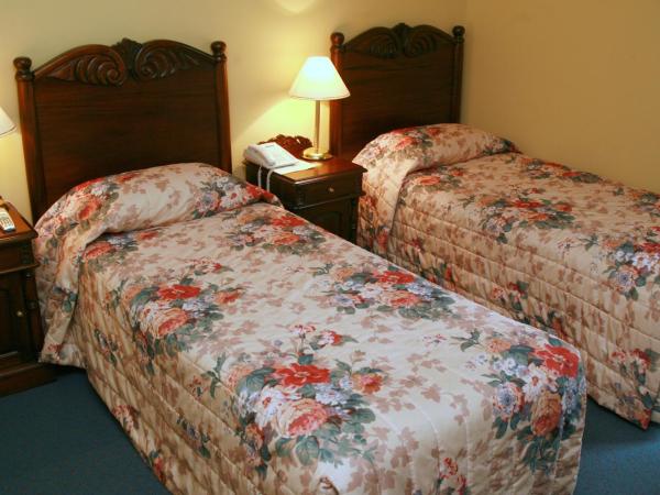 Avonmore On The Park Boutique Hotel : photo 4 de la chambre chambre lits jumeaux - vue sur jardin