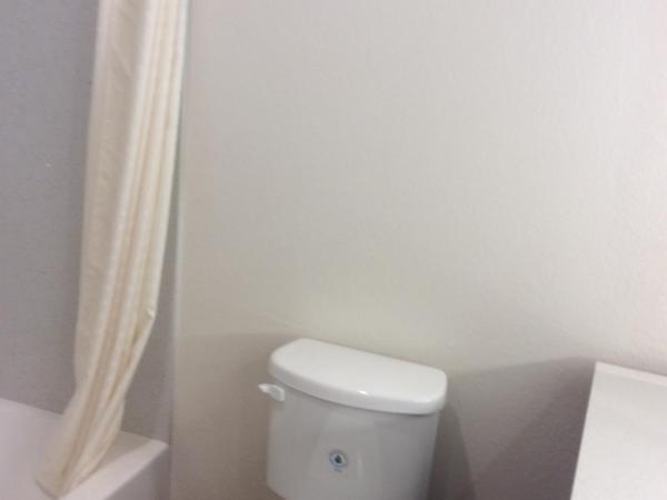 Regency Inn & Suites- NW Houston : photo 1 de la chambre deluxe queen studio with two queen beds and sofa - non-smoking