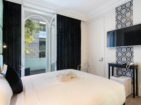 Sydney Boutique Hotel : photo 6 de la chambre chambre lit king-size avec balcon