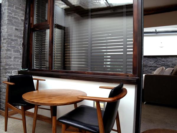 The Orchid Hotel - Old Town & Drum Tower : photo 5 de la chambre hébergement the orchid hidden annex