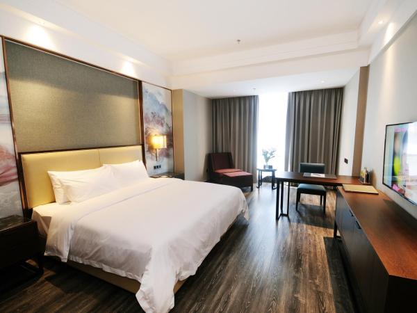 Airport Jianguo Hotel : photo 1 de la chambre chambre double deluxe