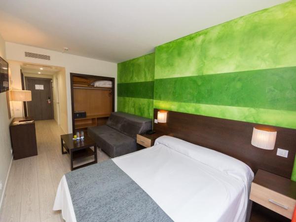 Apartamentos Recoletos : photo 6 de la chambre chambre double ou lits jumeaux