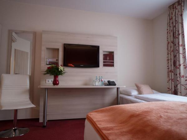 Hotel Rödelheimer Hof - Am Wasserturm : photo 2 de la chambre chambre triple