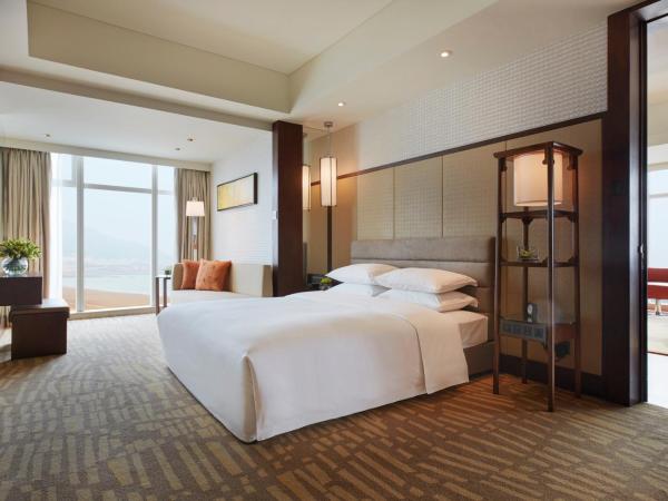 Hyatt Regency Qingdao : photo 1 de la chambre suite lit king-size exécutive - vue sur océan