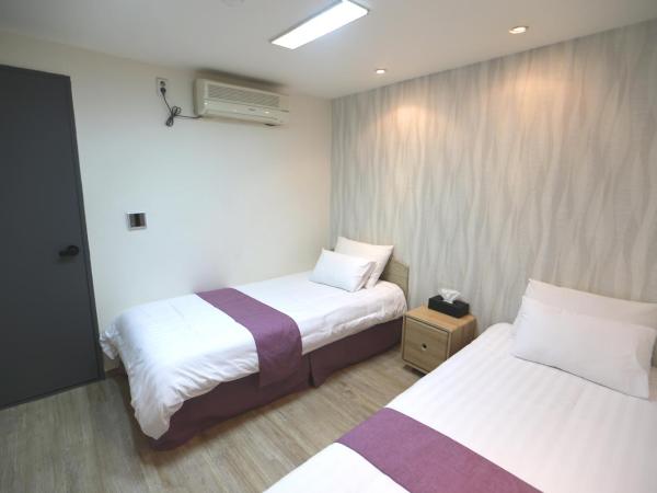 Must Stay Hotel Myeongdong : photo 5 de la chambre chambre lits jumeaux