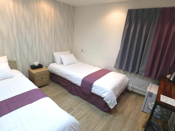 Must Stay Hotel Myeongdong : photo 3 de la chambre chambre lits jumeaux