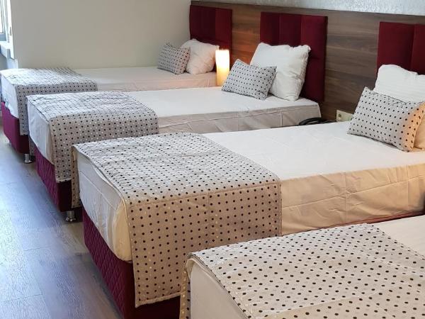 Laleli Hotel Izmir : photo 2 de la chambre chambre quadruple Économique